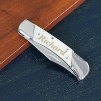 Engraved White Bone Folding Knife